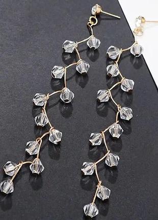 Стильні довгі золотисті сережки кульчики підвіси білі чорні кристали намистини3 фото