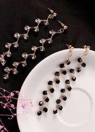 Стильні довгі золотисті сережки кульчики підвіси білі чорні кристали намистини4 фото