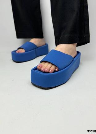 Шлепанцы на танкетке