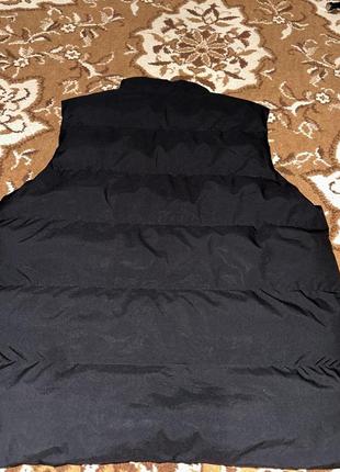 Женская жилетка