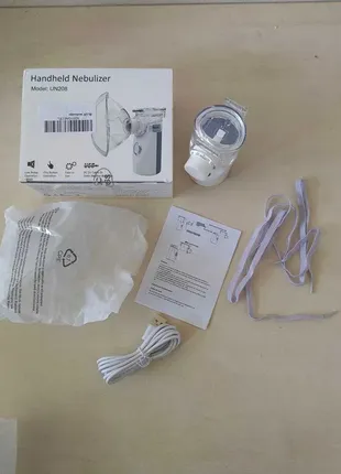 Ингалятор handheld nebulizer model: un2082 фото