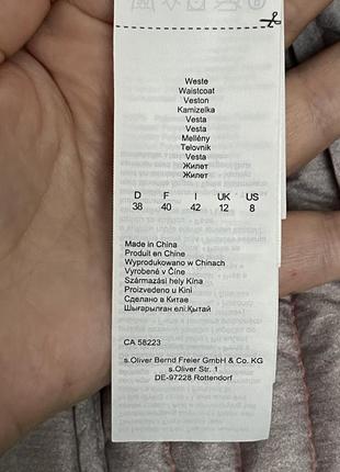 Пухова жилетка6 фото