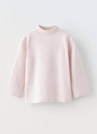 Розовая водолазка