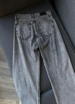 Серые джинсы с разрезами2 фото