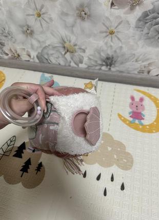 Іграшка на коляску