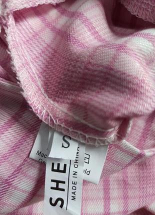 Розовая юбка мини в клетку с разрезами4 фото