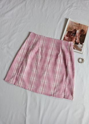 Розовая юбка мини в клетку с разрезами1 фото