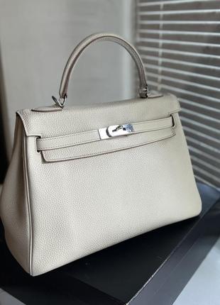 Сумка натуральная кожа hermes kelly 32  номерная в идеальном состоянии по сути как новая