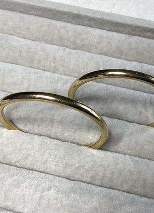 Сережки кільця кліпси золотого тону
