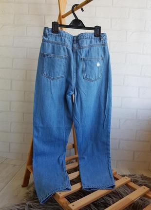 Стильные джинсики с дырочками (*есть утяжка)👭
13 рочков 
состояние: идеальный 
цена: 425грн💰6 фото