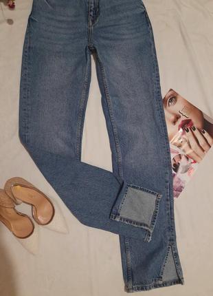 Трендовые джинсы с разрезами3 фото