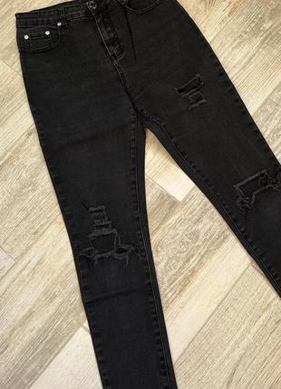 Рваные черные джинсы скинни1 фото