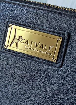Шикарная кожаная косметическая сумочка catwalk collection.3 фото