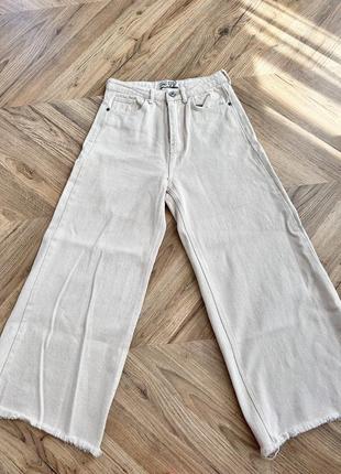 Джинси молочні широкі
