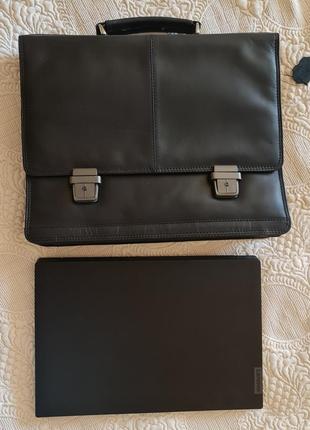 Новий шкіряний портфель