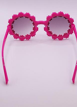 Дитячі сонцезахисні окуляри. оправа - ромашка. рожеві2 фото