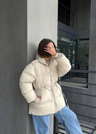 Дутый стеганый пуховик на кулиске