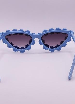 Дитячі сонцезахисні окуляри. оправа - ромашка. блакитні2 фото