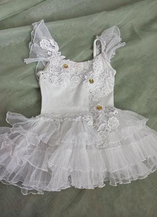 Детский набор для хореографии ( юбочка и чешки) примерно на 5-7 лет.