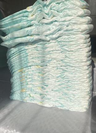 Продам подгузники одним лотом