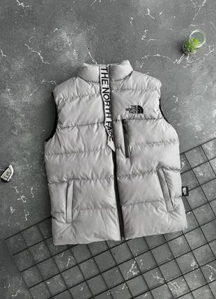 The north face жилетка