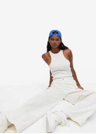 Трендові джинси молочного кольору 9