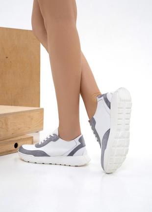 Білі кросівки із сірими вставками3 фото