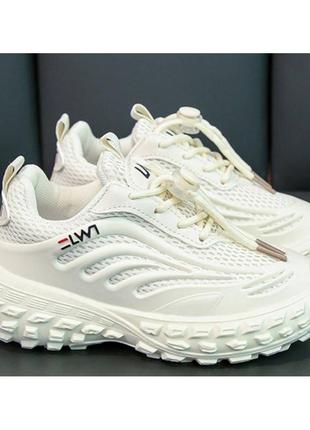 Кросівки дитячі білі з бежевим2 фото
