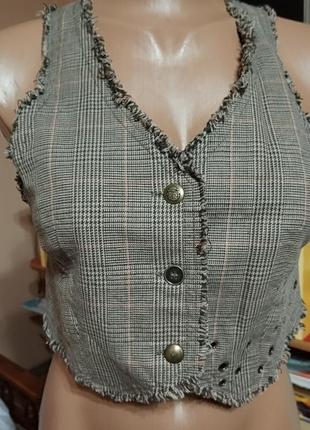 Камізелька в клітинку