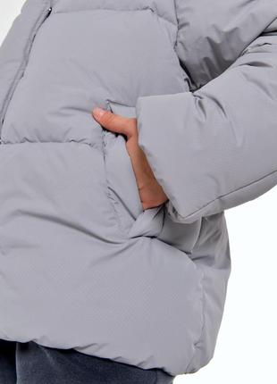 Зимний пуховик серого цвета3 фото