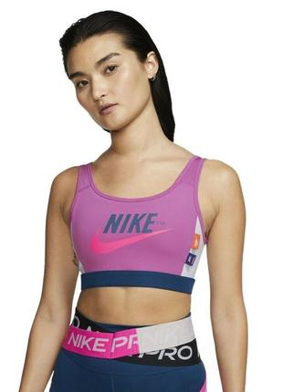 Розовый спортивный бюстгальтер топ фирмы nike swoosh icon clash medium support sports bra размер l