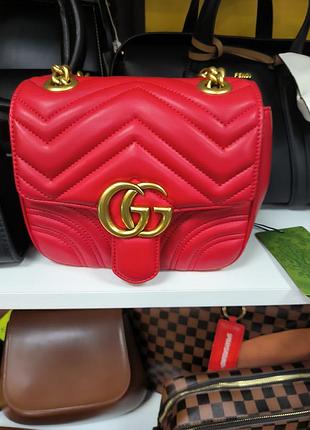 Стильна сумочка відомого бренду