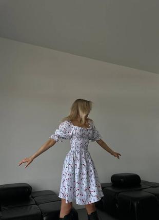 Муслінова коротка сукня з квітковим принтом з резинкою в корсеті з четвертними рукавами ліхтариками на резинці2 фото