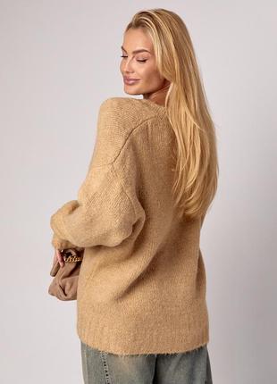 Жіночий oversize кардиган на ґудзиках з пухнастої пряжі4 фото