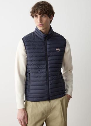 Пухова демосезонна жилетка розмір l