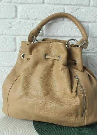 Велика добротнюща сумка з натуральної шкіри geniune leather. італія.7 фото