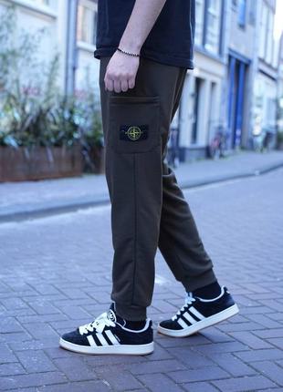 Штани stone island