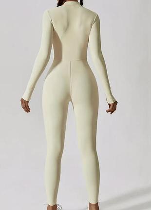Спортивний еластичний комбінезон костюм на блискавці світло жовтий4 фото