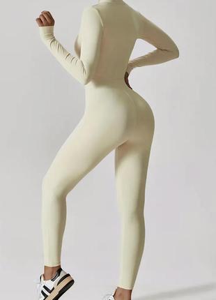 Спортивний еластичний комбінезон костюм на блискавці світло жовтий2 фото