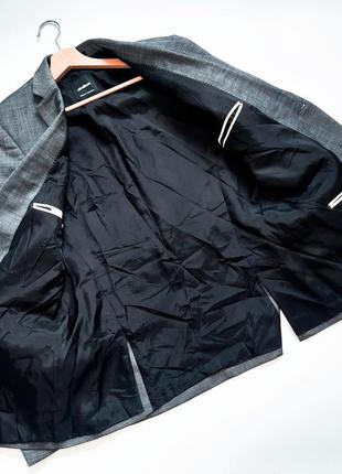 Чоловічий сірий піджак з кишенями на гудзиках від бренду strellson3 фото