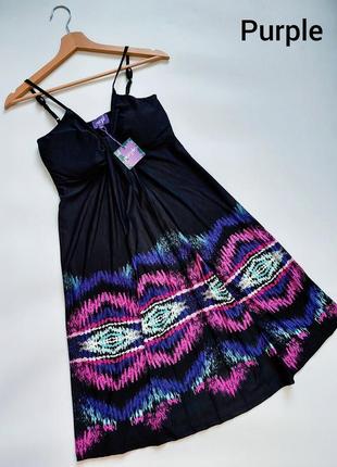 Нова жіноча чорна сукня на бретелях з декольте з принтом від бренду purple. сток.1 фото