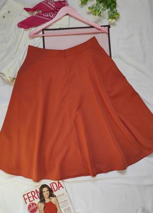 Стильная пышная юбка с карманами имеет декор пуговицы полусолнце юбочка терракотовая меди легкая7 фото