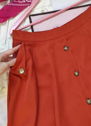 Стильная пышная юбка с карманами имеет декор пуговицы полусолнце юбочка терракотовая меди легкая3 фото