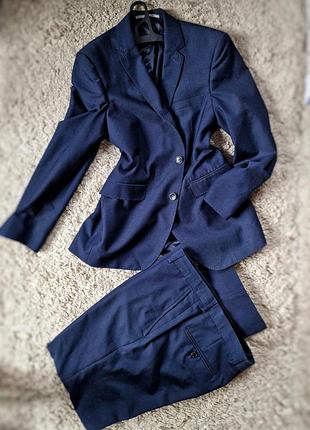 Качественный темно-синий брючный костюм размер