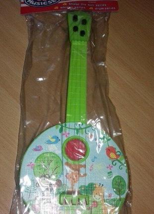 Гітара іграшкова струнна кругла. уважно  читайте  умови  пересилки!!!