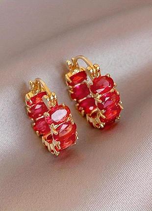 Золотистые красные овальные серьги циркон медзолото ювелирные изделия тренд
