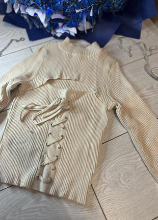 Гольф со шнуровкой в рубчик