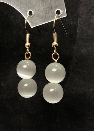 Сережки з натурального каменю котяче око біле d-10мм+- l-42мм+-