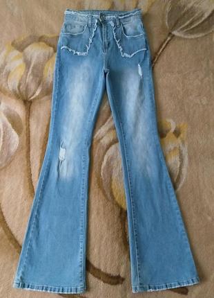 Крутые джинсы клеш с бахромой. палаццо. стрейчевые. голубые.9 фото