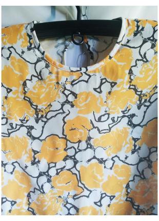 Розпродаж блуза жіноча блузочка  під шифон з оборкою внизу. 
колір насичений жовтий. 
склад: 100%поліестер. 
стан відмінний,без дефектів.4 фото